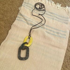 Leather,lacquer and horn necklace.  New!
